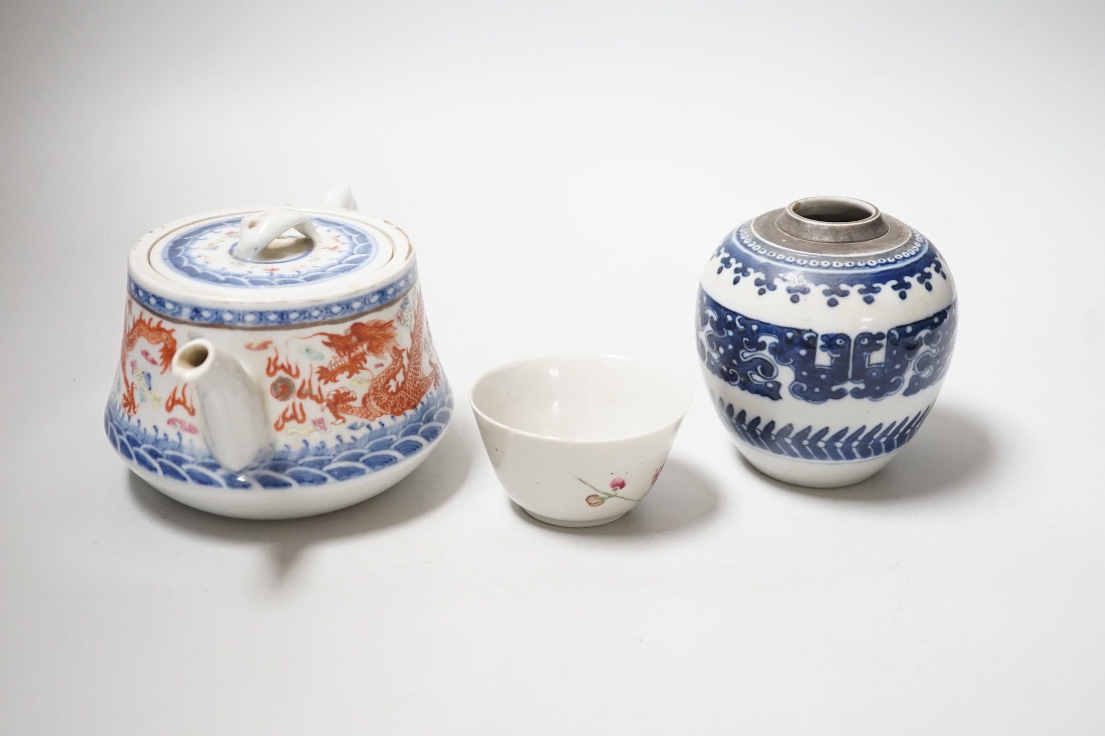 A Chinese blue and white ovoid vase, 9cm, a dragon teapot and cover and a famille rose cup